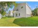 View of the back of the house showing the covered patio and grassy yard at 2426 Park St., North Myrtle Beach, SC 29582