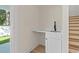 Cozy bar area with a sink, white cabinets, and modern fixtures at 2426 Park St., North Myrtle Beach, SC 29582