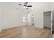Bedroom has a ceiling fan, wood-look floors, and a view of the neighborhood at 2426 Park St., North Myrtle Beach, SC 29582
