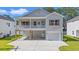 Charming two-story home with a spacious front porch and a one-car garage at 2426 Park St., North Myrtle Beach, SC 29582