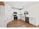 Well-lit kitchen featuring white cabinets, subway tile backsplash, and stainless steel appliances at 2426 Park St., North Myrtle Beach, SC 29582