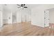 Spacious living room with hardwood floors and a staircase with white risers at 2426 Park St., North Myrtle Beach, SC 29582