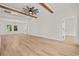 Bright and airy living room with hardwood floors and wood beam ceiling at 2426 Park St., North Myrtle Beach, SC 29582