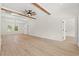 Open living area featuring ceiling beams and wood-look flooring at 2426 Park St., North Myrtle Beach, SC 29582