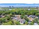 Aerial view showcases three homes with skyline views and lush greenery, creating a serene atmosphere at 2428 Park St., North Myrtle Beach, SC 29582