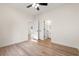 Bedroom featuring laminate floors, white walls and open doorways at 2428 Park St., North Myrtle Beach, SC 29582