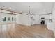 Open floor plan living room and kitchen with wood floors and lots of natural light at 2428 Park St., North Myrtle Beach, SC 29582