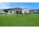 Spacious fenced backyard featuring a patio area and ample space for outdoor activities and relaxation at 280 Macarthur Dr., Conway, SC 29527