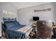 Inviting bedroom featuring wood-look floors, comfortable furniture, and modern decor creates a serene and relaxing atmosphere at 280 Macarthur Dr., Conway, SC 29527