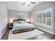 Cozy bedroom with vaulted ceilings, a plush rug, and shuttered windows at 280 Macarthur Dr., Conway, SC 29527