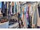 Well-organized walk-in closet with ample storage and colorful clothing at 280 Macarthur Dr., Conway, SC 29527