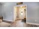 Inviting entryway boasts wood-look floors and a decorative front door with sidelight, offering a warm welcome at 280 Macarthur Dr., Conway, SC 29527