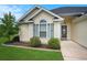 Well-maintained home exterior with pristine landscaping and charming front entry at 280 Macarthur Dr., Conway, SC 29527