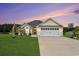 Charming home with a two-car garage and well-manicured lawn at 280 Macarthur Dr., Conway, SC 29527