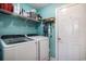 Well-equipped laundry room with modern appliances and ample shelving space at 280 Macarthur Dr., Conway, SC 29527