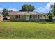 Charming single-story home with a well-manicured lawn and inviting front porch at 320 Edgewood Circle, Conway, SC 29527