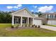Charming single-story house featuring a landscaped front yard and a convenient two-car garage at 3217 Shadow Pine Ct., Myrtle Beach, SC 29579