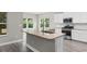 Spacious kitchen island with hardwood floors, granite countertop and stainless steel dishwasher at 3217 Shadow Pine Ct., Myrtle Beach, SC 29579