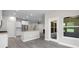 Open-concept kitchen with granite countertops, stainless steel appliances, and an adjacent dining area at 3217 Shadow Pine Ct., Myrtle Beach, SC 29579