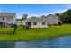 Spacious backyard near a pond, perfect for relaxing and outdoor activities at 326 Picnic Basket Pl., Longs, SC 29568