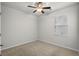 Serene bedroom with plush carpet, a ceiling fan, and a window offering ample natural light at 326 Picnic Basket Pl., Longs, SC 29568