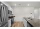 Open concept kitchen with stainless steel appliances and granite countertops at 326 Picnic Basket Pl., Longs, SC 29568