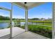Screened in porch with view of community pond at 326 Picnic Basket Pl., Longs, SC 29568