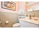 Cozy bathroom featuring a white vanity and retro pastel-colored tiling at 3602 Magnolia St. # 3602, Myrtle Beach, SC 29577