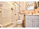 The bathroom features a glass-enclosed shower, tile flooring, sink, and a functional toilet at 3602 Magnolia St. # 3602, Myrtle Beach, SC 29577