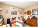This inviting bedroom has a unique Florence Italy wall sign, dresser, and ample wall decor at 3602 Magnolia St. # 3602, Myrtle Beach, SC 29577