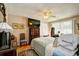 Cozy bedroom features a ceiling fan, and a flat screen television on a wooden dresser at 3602 Magnolia St. # 3602, Myrtle Beach, SC 29577