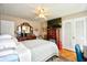 Bedroom featuring wood floors, a ceiling fan, and classic furniture for a relaxing space at 3602 Magnolia St. # 3602, Myrtle Beach, SC 29577
