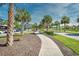 The Market Common pedestrian walkway features palm trees, landscaping, and nearby shops and restaurants at 3602 Magnolia St. # 3602, Myrtle Beach, SC 29577