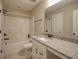 Bathroom with granite vanity, single sink, and tub-shower combination at 376 Mikita Dr., Surfside Beach, SC 29575