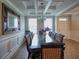 Formal dining room featuring coffered ceiling, chandelier, and a large table with seating for ten at 376 Mikita Dr., Surfside Beach, SC 29575