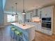 Gourmet kitchen with granite countertops, stainless steel appliances, ample cabinet space, and center island at 376 Mikita Dr., Surfside Beach, SC 29575