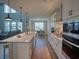 Modern kitchen featuring stainless steel appliances, granite countertops and pendant lighting at 376 Mikita Dr., Surfside Beach, SC 29575