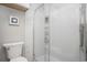 Bright, fully-tiled bathroom with a glass shower and modern fixtures at 403 71St Ave. N # 5, Myrtle Beach, SC 29572