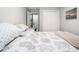 View of a comfortable bedroom featuring a closet, desk, and neutral colored decor at 403 71St Ave. N # 5, Myrtle Beach, SC 29572