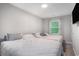 Comfortable bedroom featuring two twin beds, soft bedding, and a peaceful ambiance at 403 71St Ave. N # 5, Myrtle Beach, SC 29572