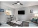 Contemporary living room features a tv and bar top looking into kitchen for easy conversation at 403 71St Ave. N # 5, Myrtle Beach, SC 29572
