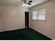 Bedroom features a standard window, neutral paint, and green carpet at 4041 Long Line Ln., Myrtle Beach, SC 29579