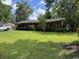 Well-manicured lawn and landscaping enhance this charming single-story home's curb appeal at 4041 Long Line Ln., Myrtle Beach, SC 29579