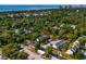 An aerial view of the property's location on a tree-lined street near the coastline and skyline at 4115 Little River Rd. # 1-E, Myrtle Beach, SC 29577