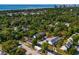 A captivating aerial shot showcasing the property amidst a lush green canopy near the coastline at 4115 Little River Rd. # 1-E, Myrtle Beach, SC 29577