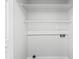 Unfinished basement with washer/dryer hookups and wire shelving ready for your customizations at 4115 Little River Rd. # 1-E, Myrtle Beach, SC 29577