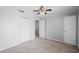 Bedroom features plush carpeting, neutral walls, and a double door closet for ample storage at 4115 Little River Rd. # 1-E, Myrtle Beach, SC 29577