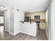 Efficient kitchen with stainless steel appliances, light cabinets, an eat-in counter, perfect for modern cooking and entertaining at 4115 Little River Rd. # 1-E, Myrtle Beach, SC 29577