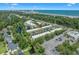 Aerial view of a coastal community featuring multiple pools and ocean views at 4701 N Kings Hwy. # 8, Myrtle Beach, SC 29577