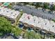 Aerial view of condominium units with small patios overlooking the parking area at 4701 N Kings Hwy. # 8, Myrtle Beach, SC 29577